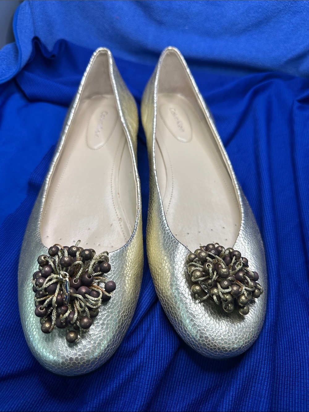 Calvin Klein Metallic Gold Makenzi Ballet Flats with Beaded Embellishment